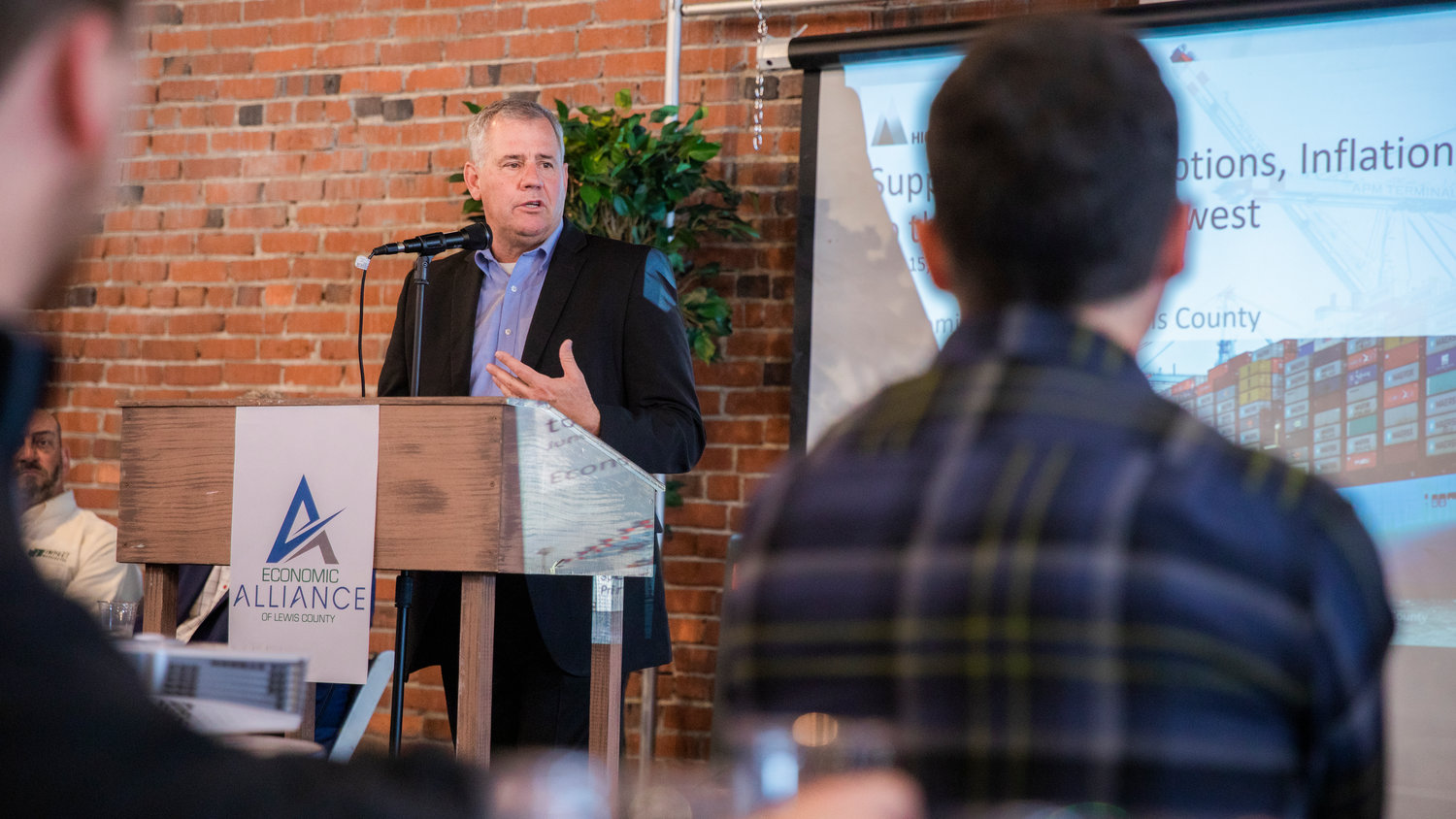 Richard DeBolt speaks to attendees inside The Loft for an Economic Alliance Summit event in Chehalis on Thursday.