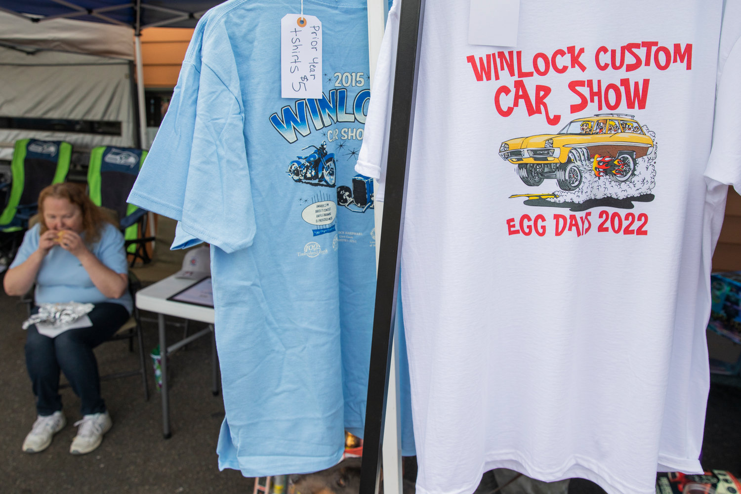 Egg Days shirts featuring the Winlock Custom Car Show hang on display Saturday morning.