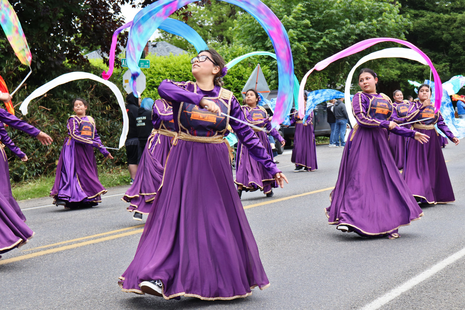 Dancers with Iglesia Centro Familiar Cristiano perform in the Swede Day Parade in Rochester on Saturday.