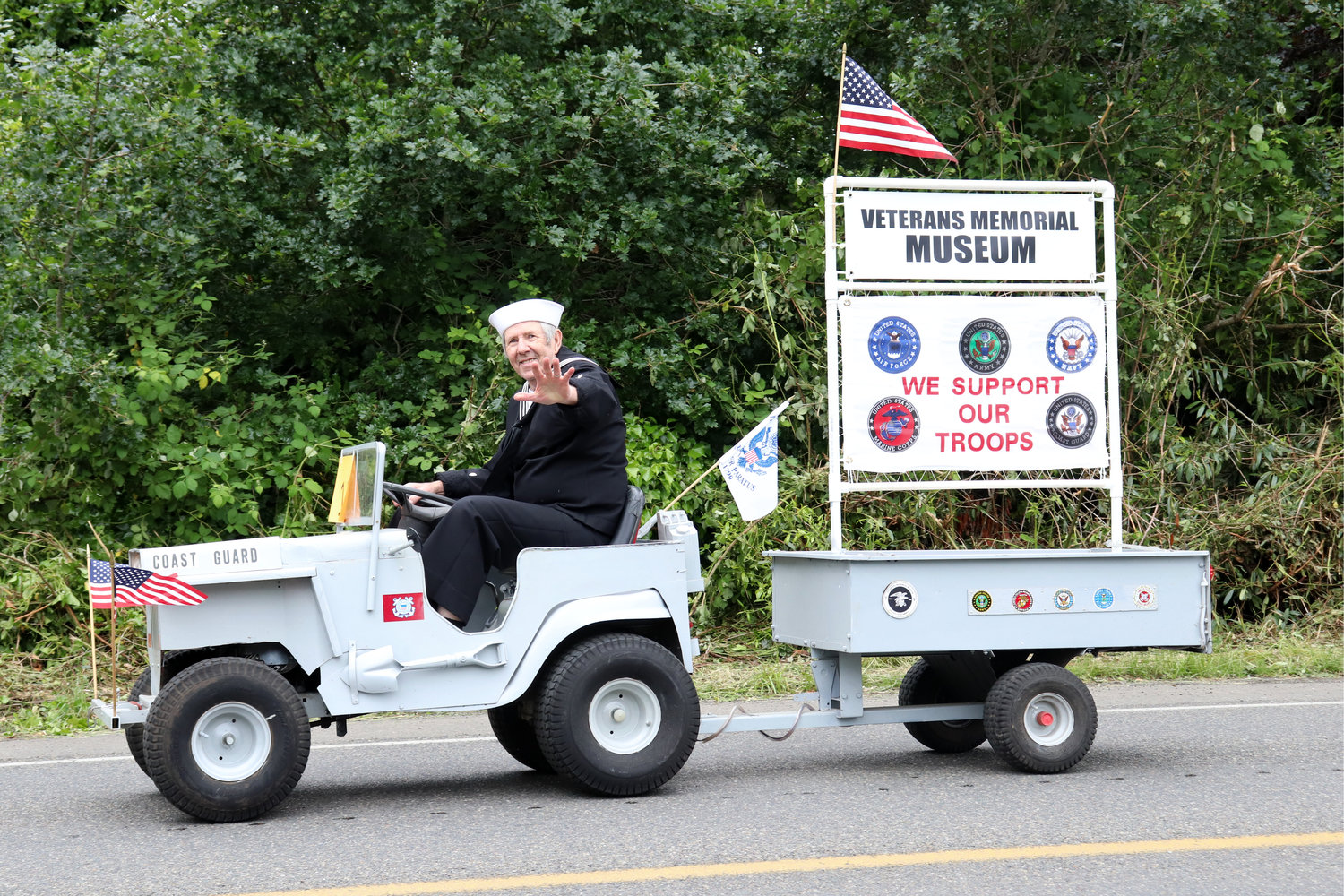 A Veterans Memorial Museum float drives through the Swede Day Parade in Rochester on Saturday.