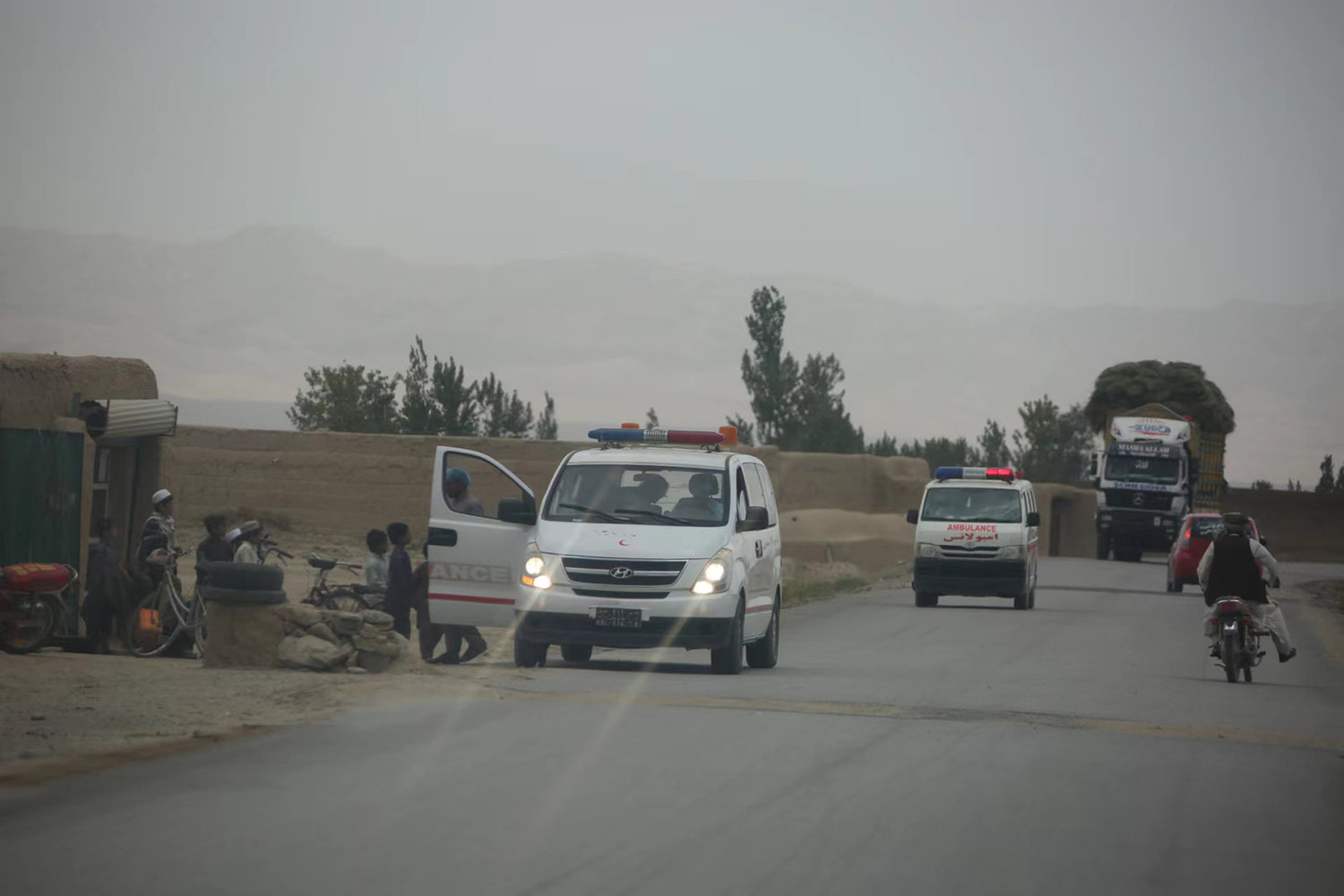 Ambulances arrive on the road in Paktika province, Afghanistan on Wednesday, June 22, 2022. The death toll from an earthquake that struck eastern Afghanistan early Wednesday has reached 920, while more than 600 people were injured, a disaster official said, adding the number of casualties might rise further. (Saifurahman Safi/Xinhua via ZUMA Press/TNS)