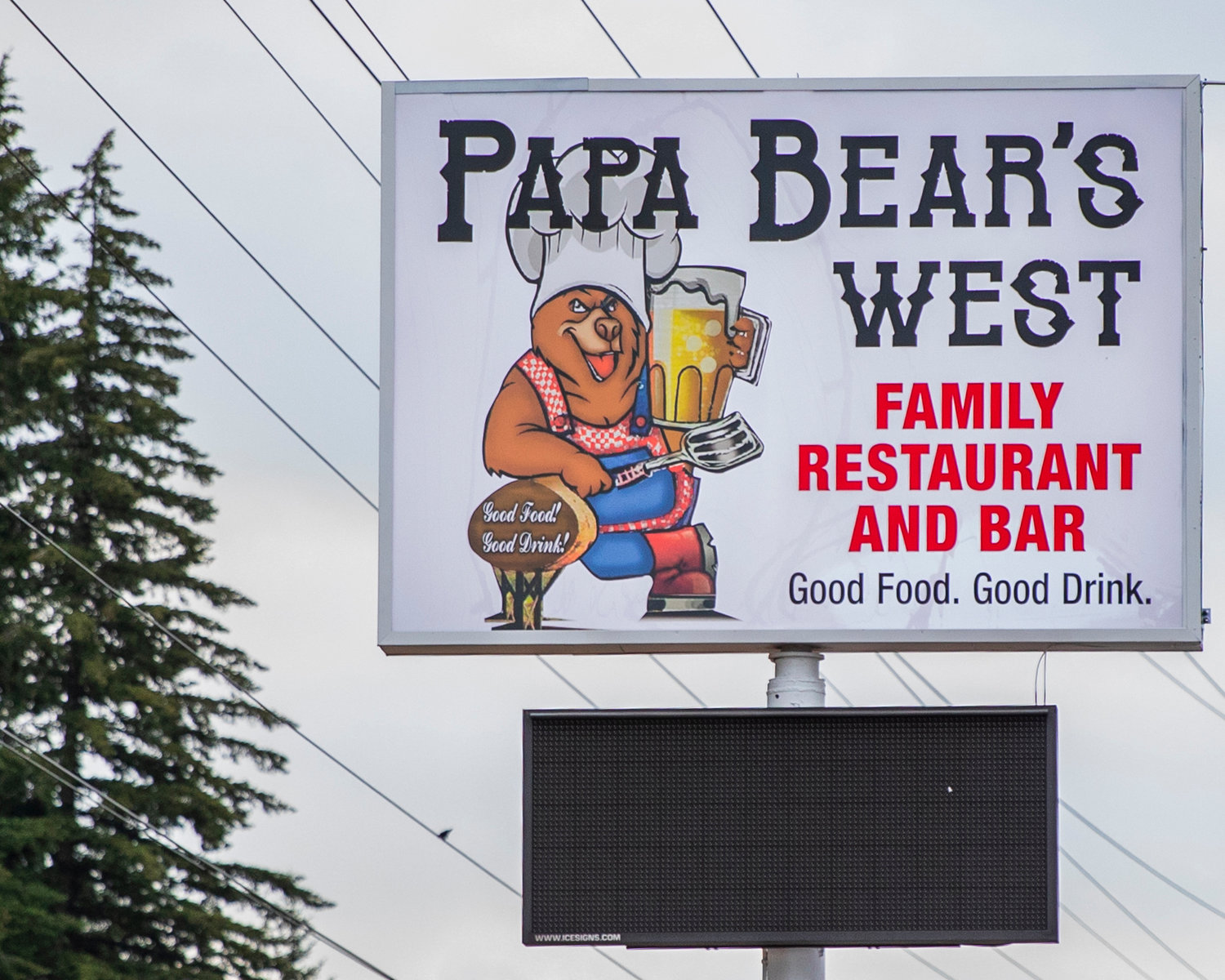 A billboard for Papa Bears West sits on display off U.S. Highway 12.