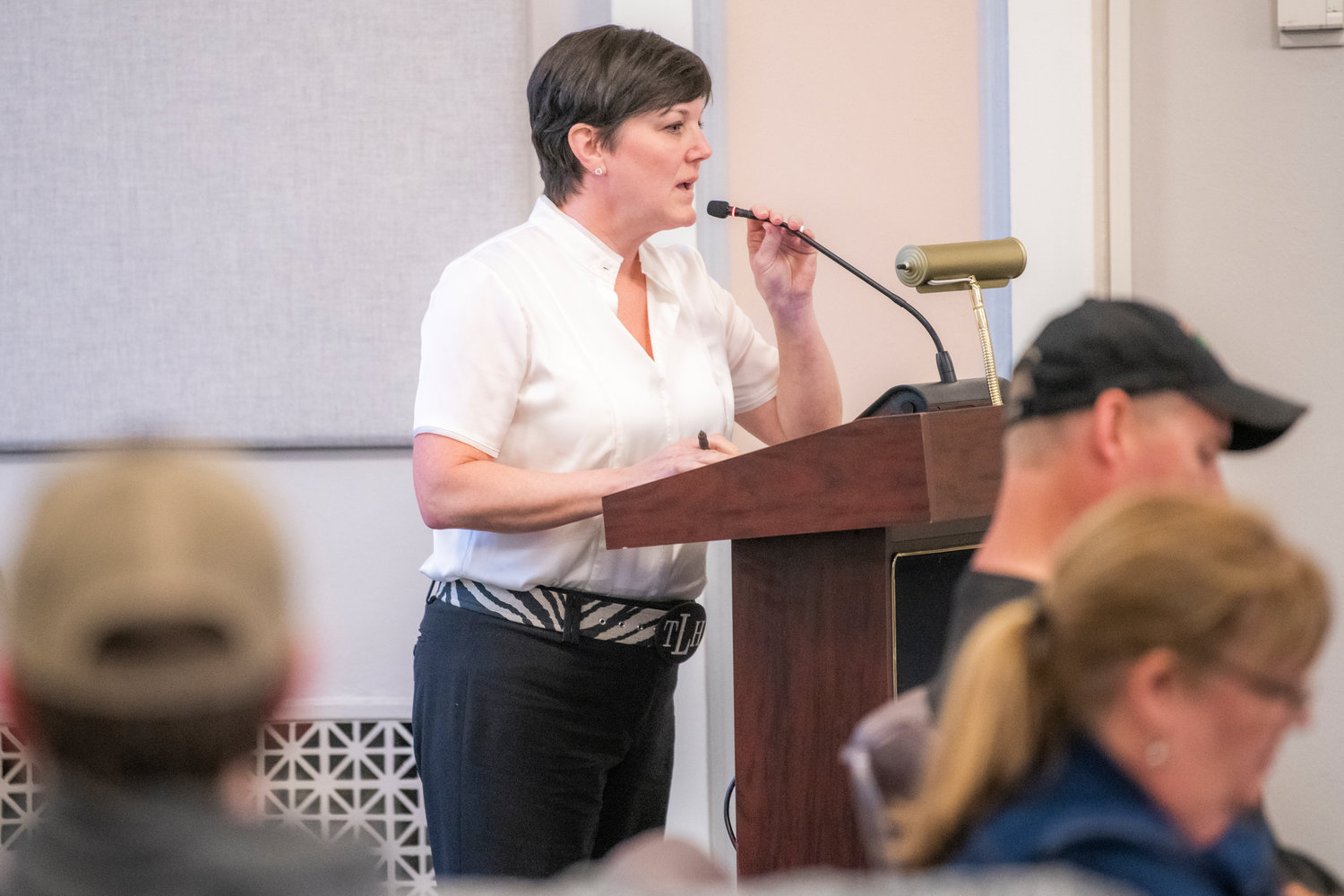 Tyra Larson, a Mineral resident, addresses the Lewis County Planning Commission at the Lewis County Courthouse in Chehalis on Tuesday evening, to say the YMCA’s proposed rezone of land north of Mineral Lake is ill-informed.