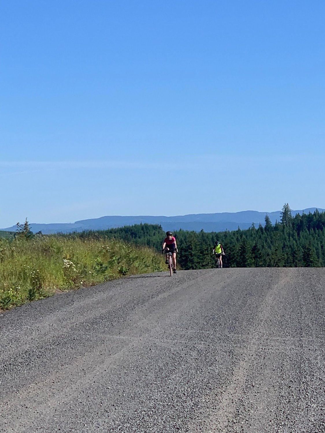 Cyclists finish their ascent up the gravel portion of Meskill Road on the way to Ceres Hill, as part of the Chris's Challenge course at Ride The Willapa 2022.