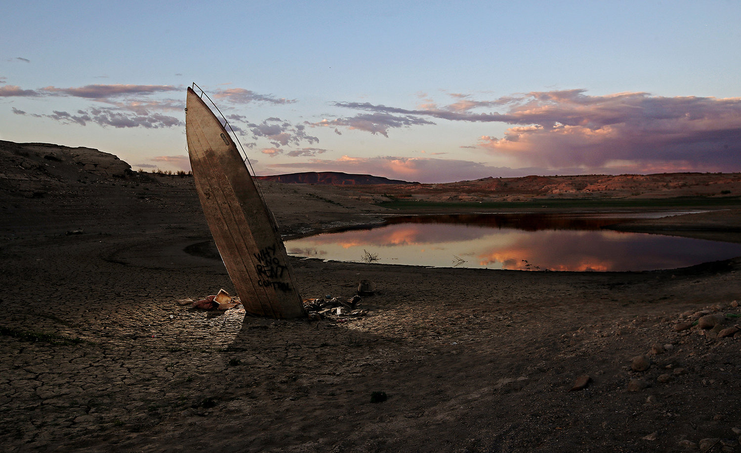 A sunken sailboat is among the years of accumulated detritus that has been exposed as water levels in Lake Mead, the nation’s largest reservoir, have dropped to 30% of capacity after almost two decades of severe drought conditions in the American West. (Luis Sinco/Los Angeles Times/TNS)