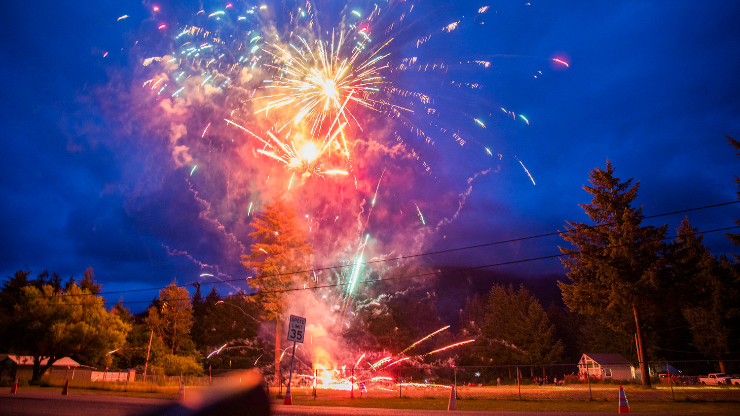 Fireworks explode in a field across from the Packwood Community Hall Saturday evening.