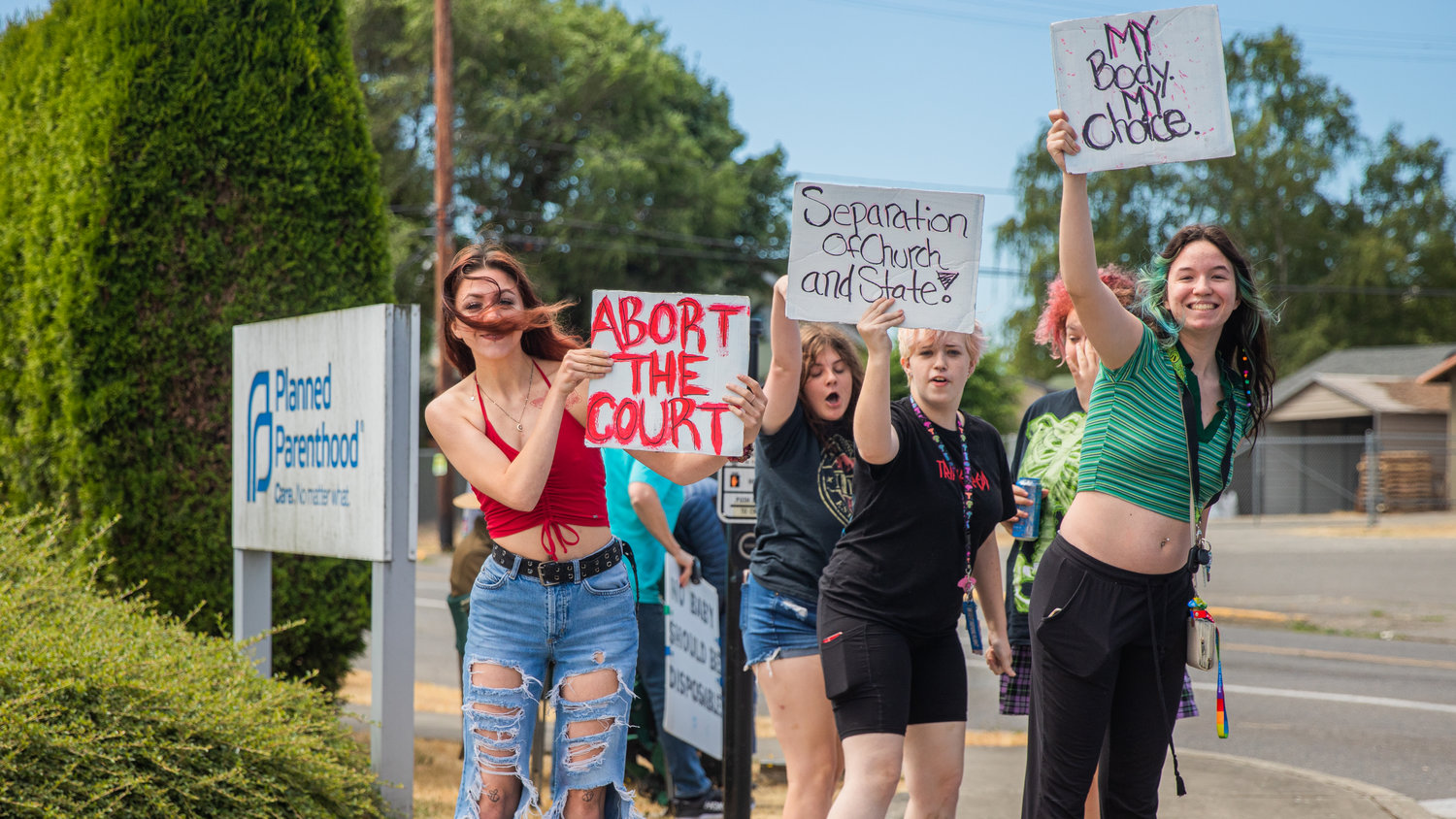 Demonstrators hold signs advocating for abortion rights outside Planned Parenthood in Centralia alongside other  anti-abortion advocates Friday afternoon.
