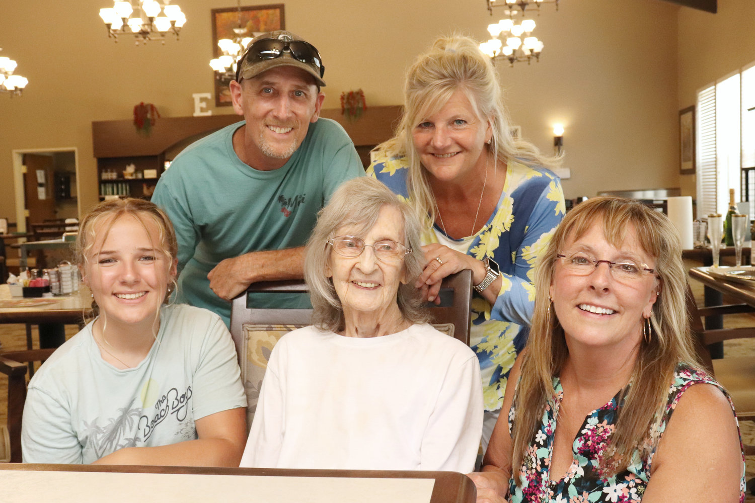 Agnes Wasson, who celebrated her 102nd birthday this week, smiles alongside her grandchildren and great grandchildren during a birthday celebration at Woodland Village in Chehalis on Monday.