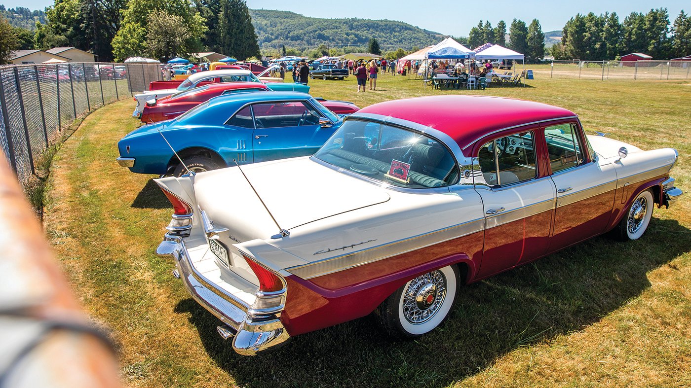 Vehicles sit on display across fields in Mossyrock on Saturday during a car show.