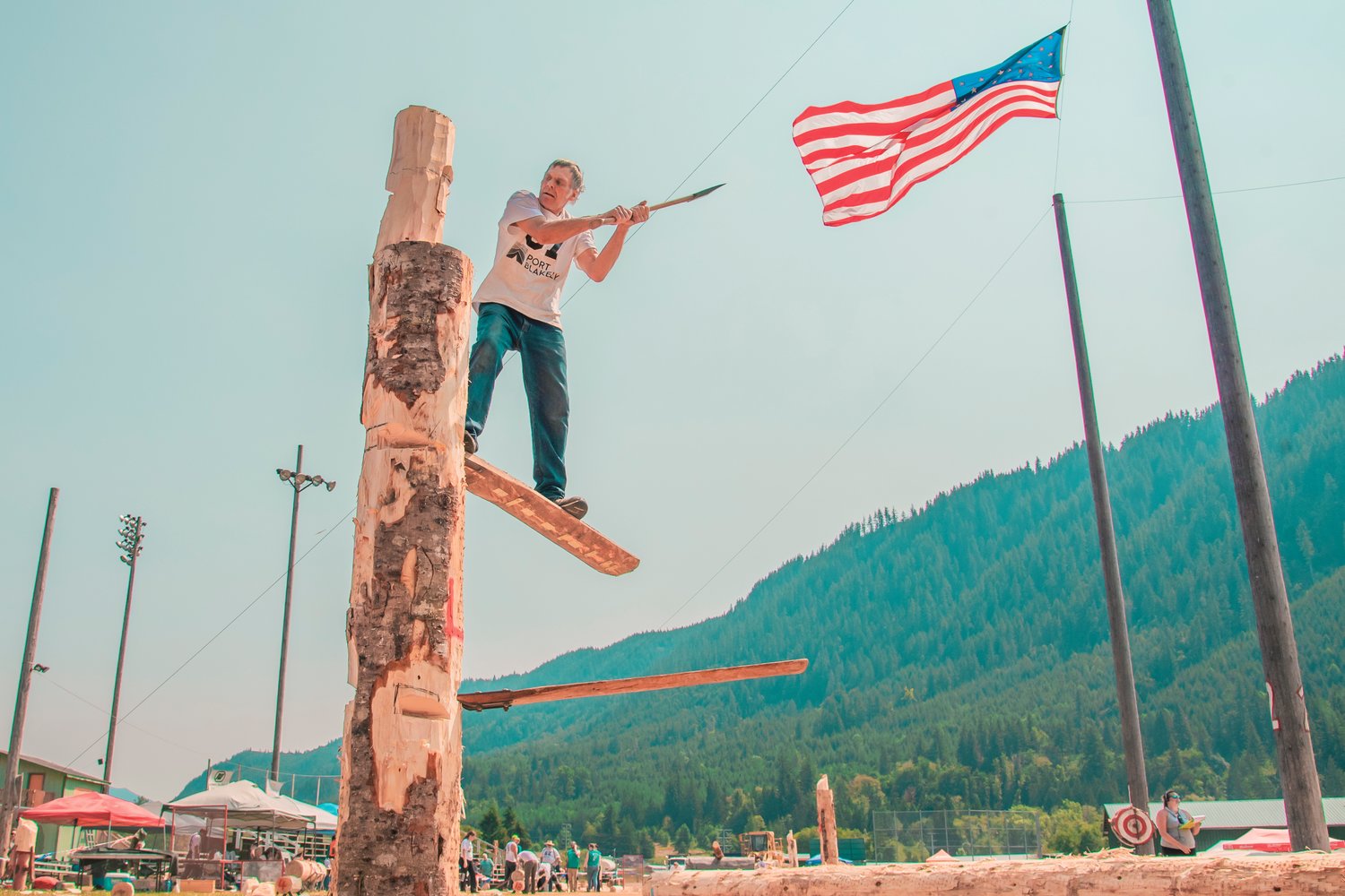 Eyler Adam stands on a springboard while competing during the Morton Loggers' Jubilee in August 2021.