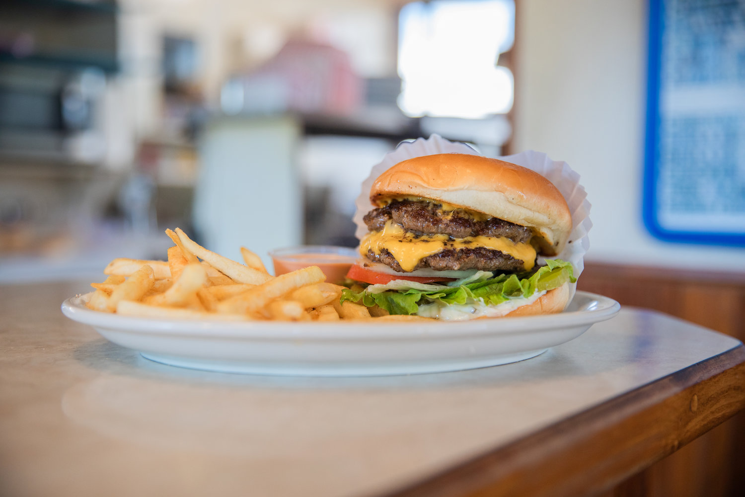A burger sits on a plate with fries at Bill and Bea’s in Centralia Tuesday afternoon.