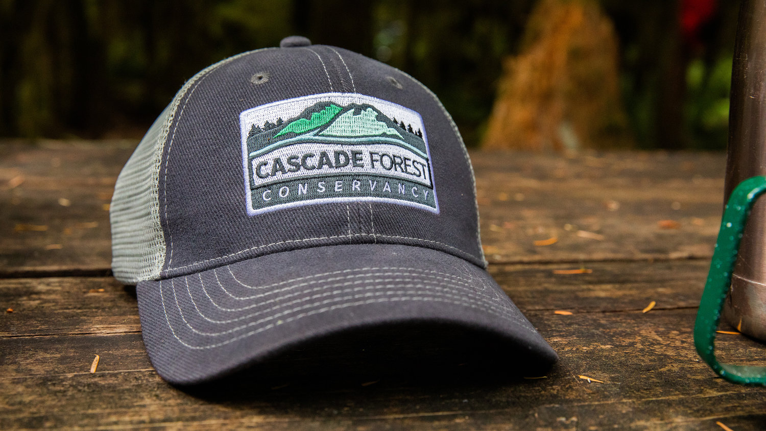 A Cascade Forest Conservancy hat sits on a picnic table at Iron Creek Campground Saturday morning.
