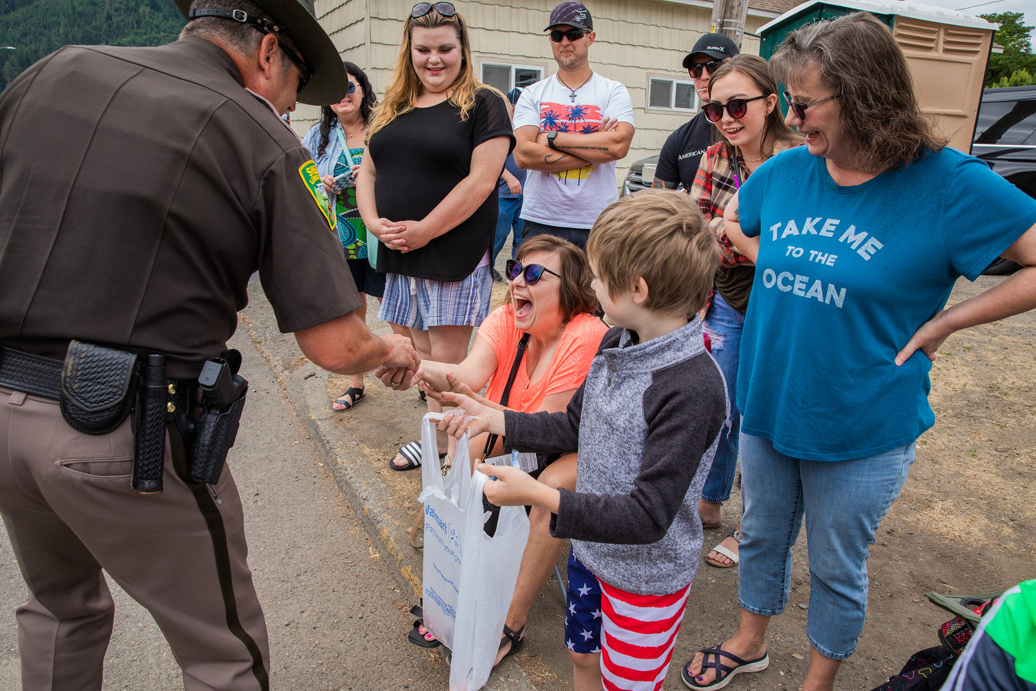 Candy is handed to parade-goers on Saturday in downtown Morton.