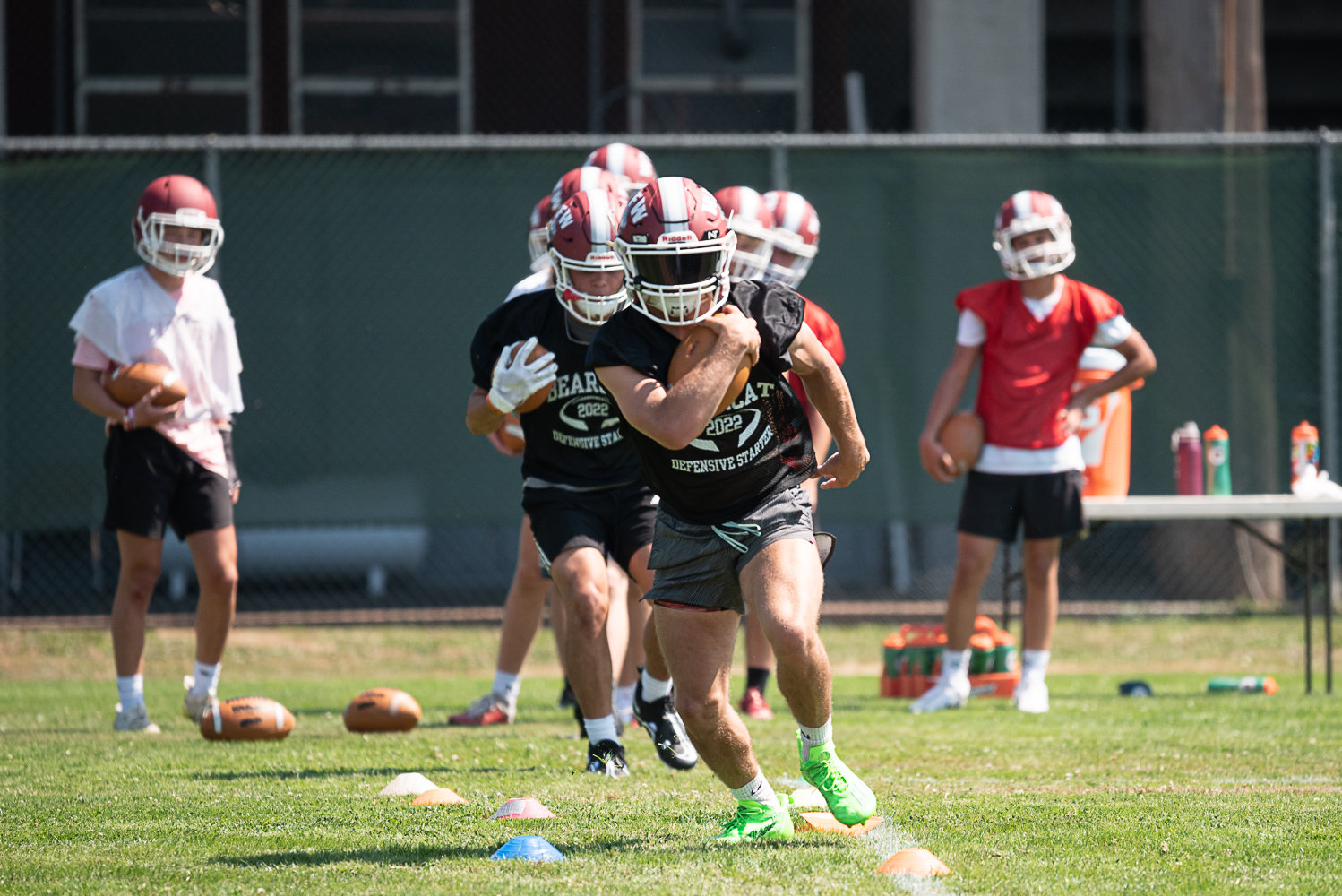 The W.F. West tailbacks work through a drill on the first day of fall camp Aug. 17 in Chehalis.