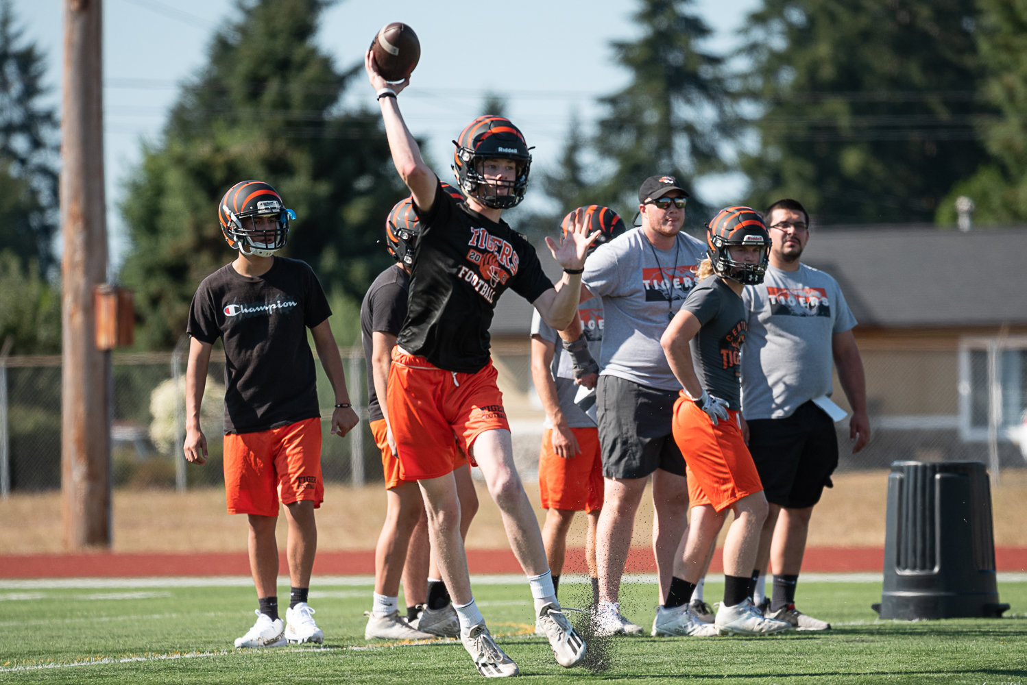 Centralia quarterback Landen Jenkins throws on the run during a drill on the first day of fall camp Aug. 17 at Tiger Stadium.