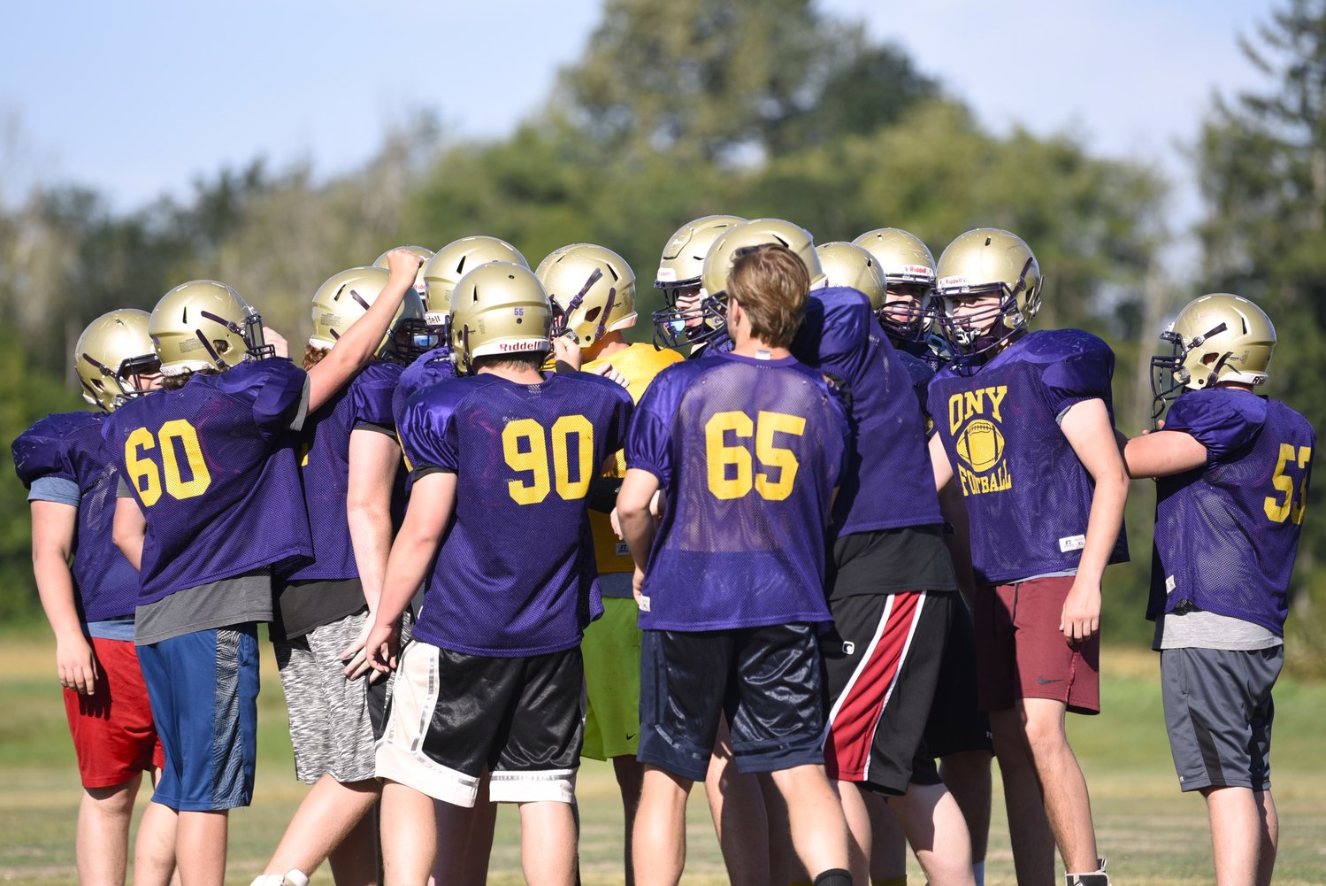 The Onalaska line gets a break after wrapping up individual drills at practice on Aug. 23.
