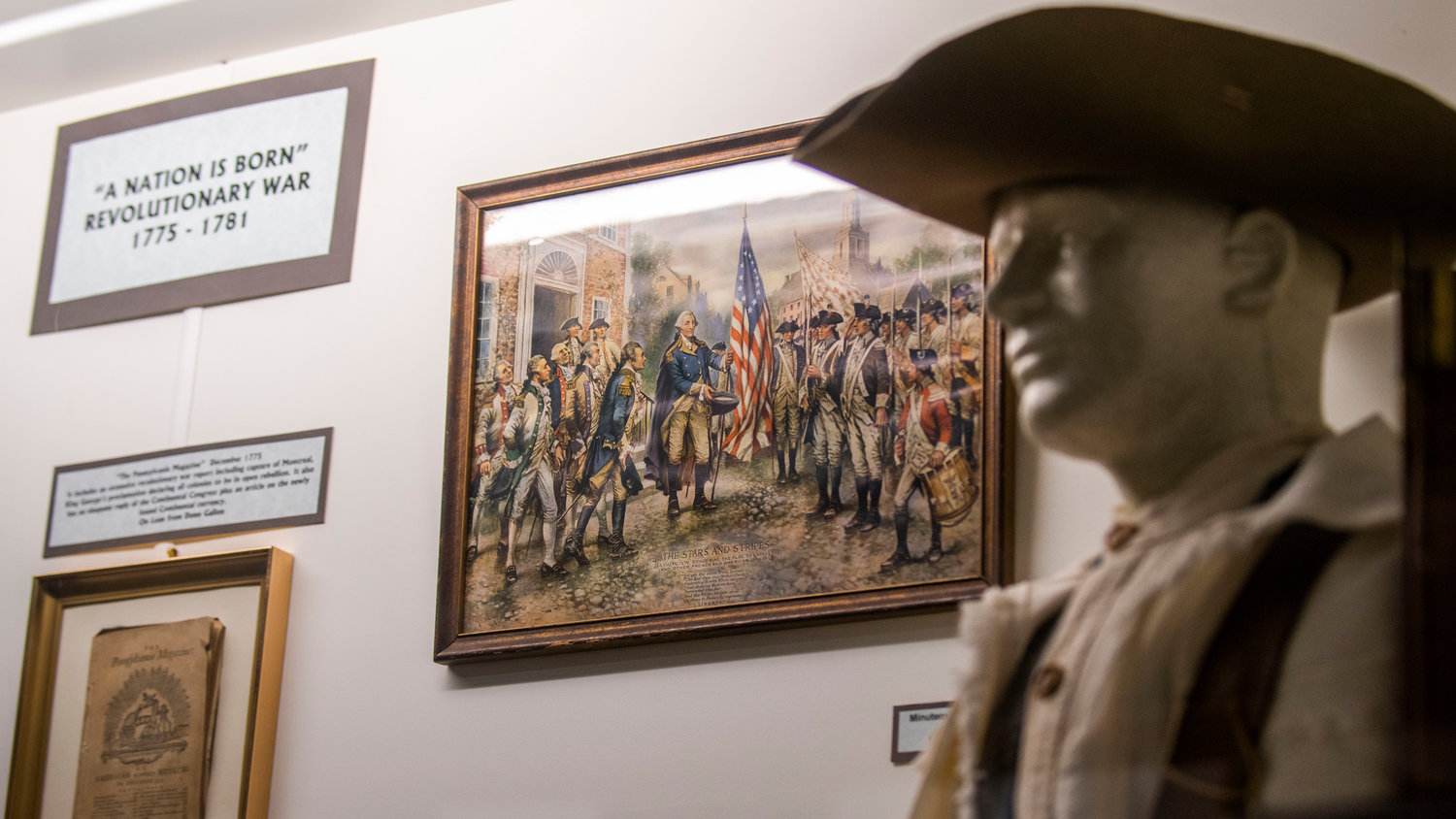 FILE PHOTO — Artwork depicts images from the Revolutionary War on display inside the Veterans Memorial Museum in Chehalis.