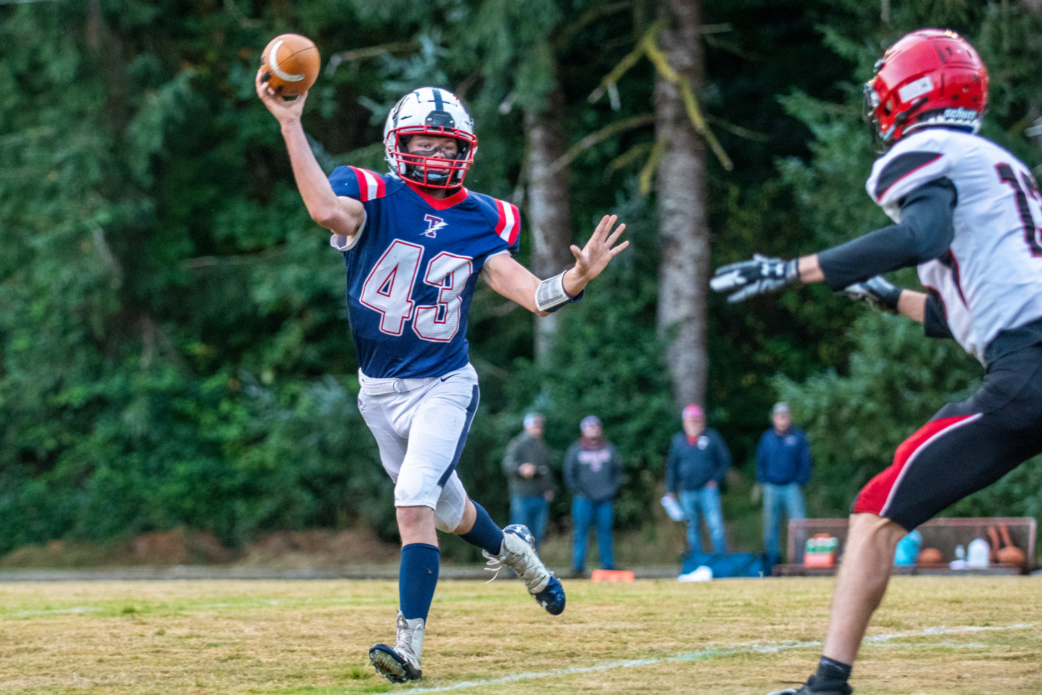 Pe Ell-Willapa Valley quarterback Kolten Fluke (43) prepares to pass during a home game against Wahkiakum at Crogstad Field in Menlo on Sept. 16.