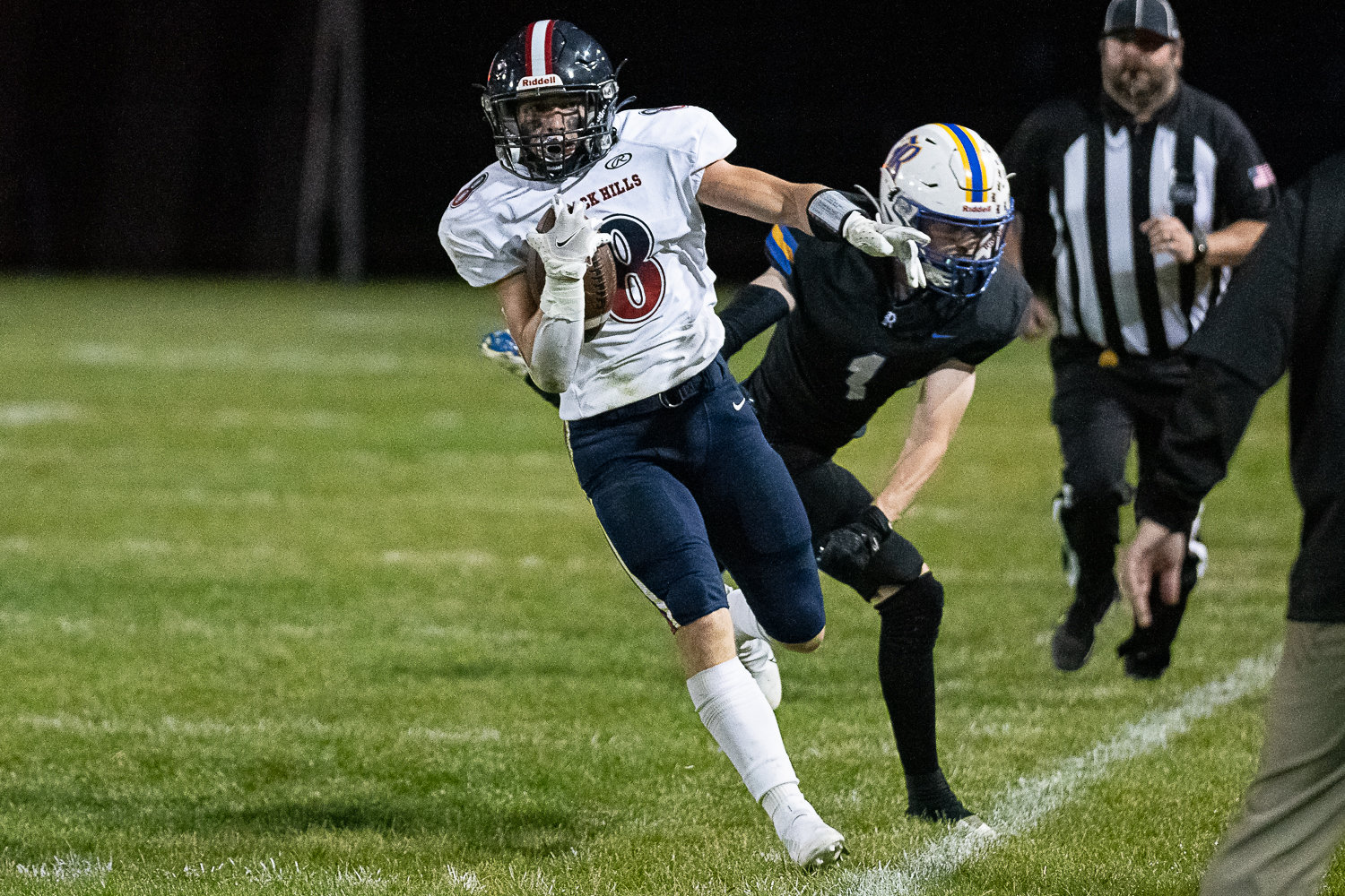Black Hills' Braiden Bond tiptoes out of bounds in a 34-14 win over Rochester Sept. 16.