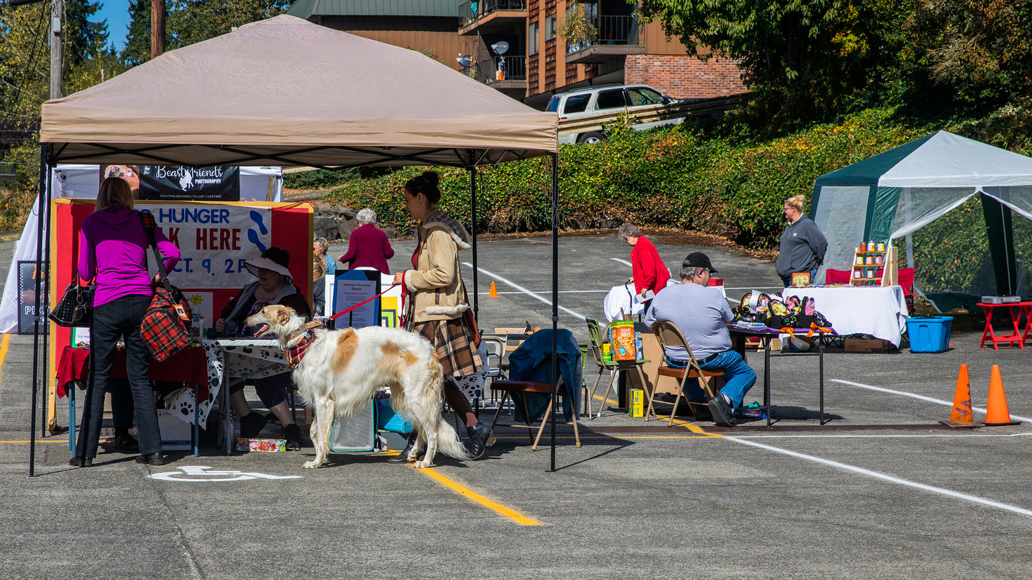 Visitors attend a free pet fair outside the Chehalis United Methodist Church on Saturday.