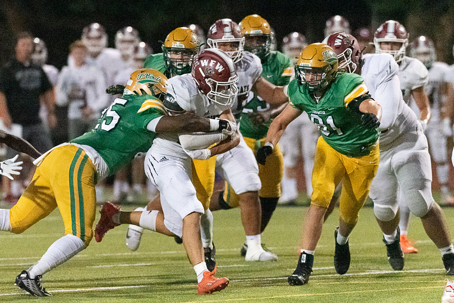Evan Stajduhar runs through a field of Thunderbirds during the first half of W.F. West's 28-7 win over Tumwater at Tumwater District Stadium on Sept. 30.