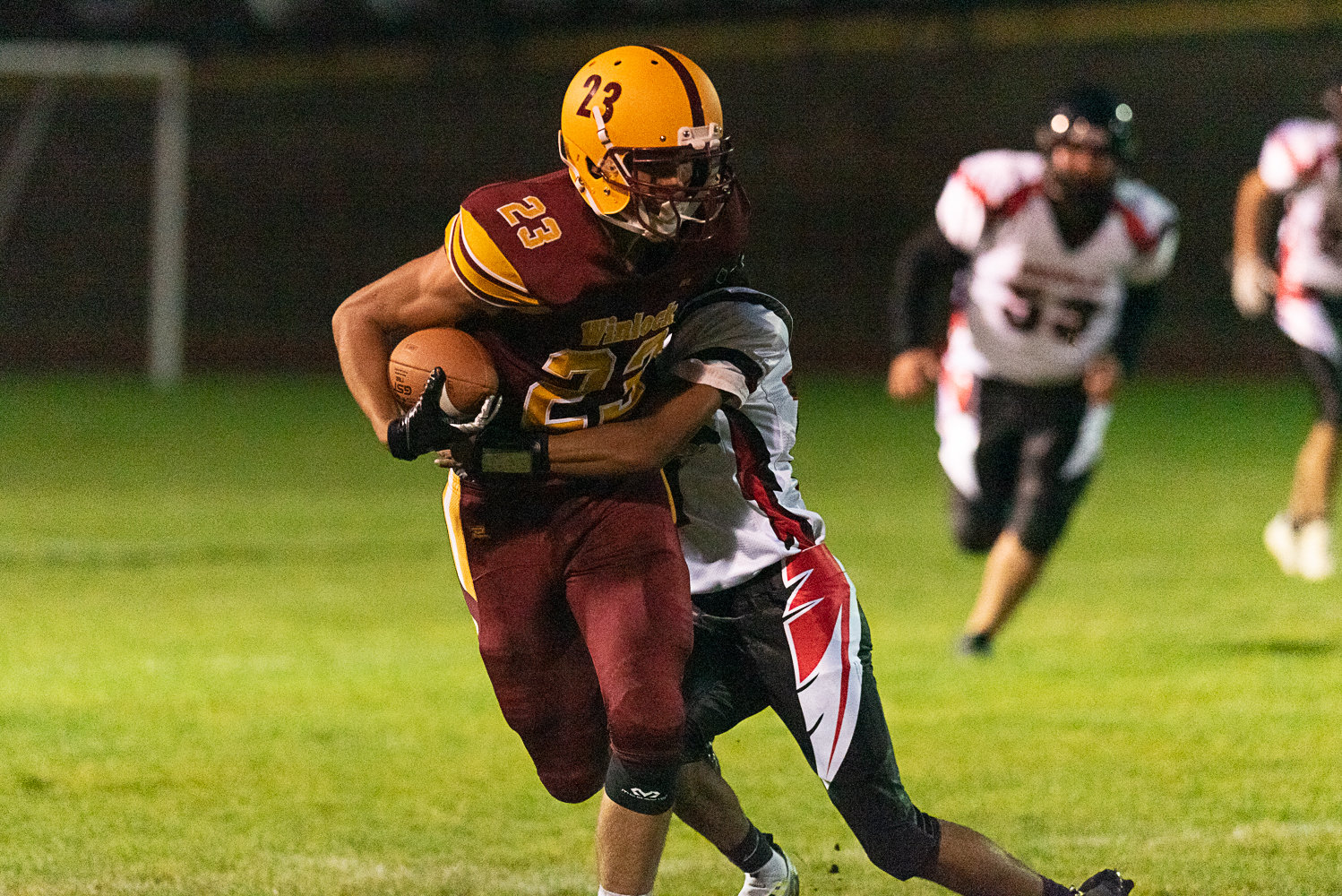 Winlock's Lincoln Ruiz racks up yards after a catch during the first quarter of the Cardinals' 36-28 win over Oakville on Oct. 7.