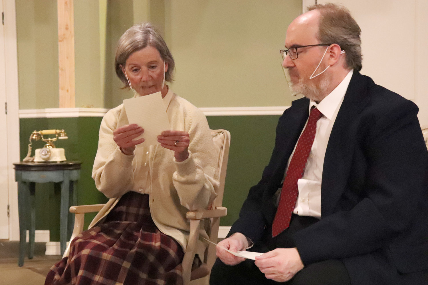 Susan Robb as Miss Marple and George Dougherty as Inspector Craddock perform on stage during a rehearsal of “A Murder is Announced” at Evergreen Playhouse last week.