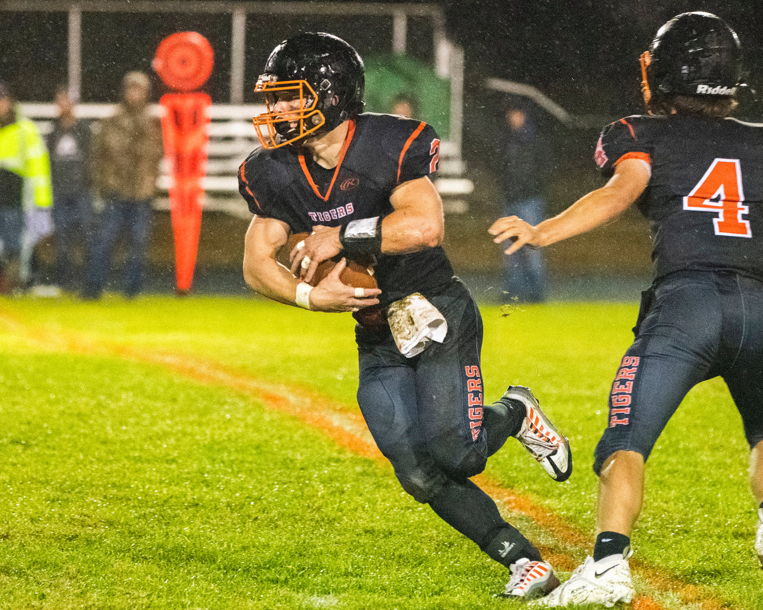 Napavine junior Cael Stanley (2) runs with the football Friday night during a league championship game against Raymond-South Bend.