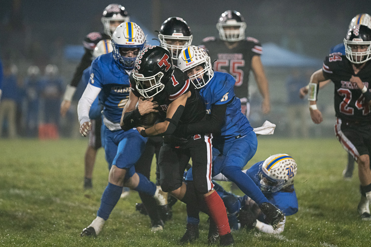 Tenino's Kysen Knox fights through contact against Rochester in the Scatter Creek Showdown Oct. 28.