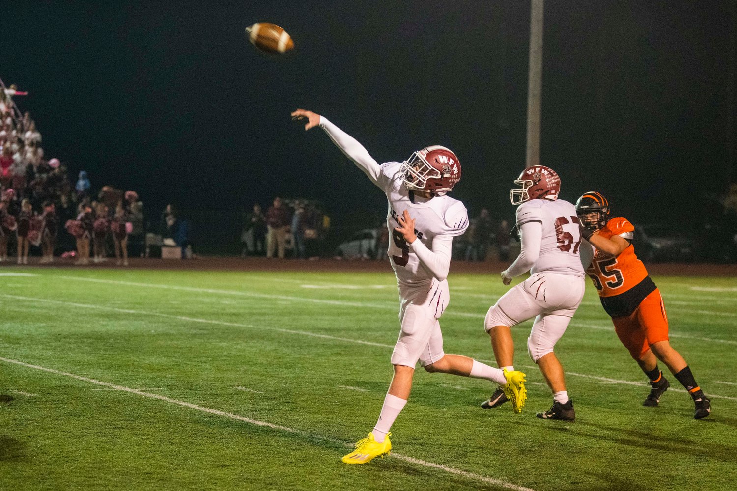 W.F. West senior Gavin Fugate (9) airs out a pass Friday night during a Swamp Cup rivalry game against Centralia at Tiger Stadium.