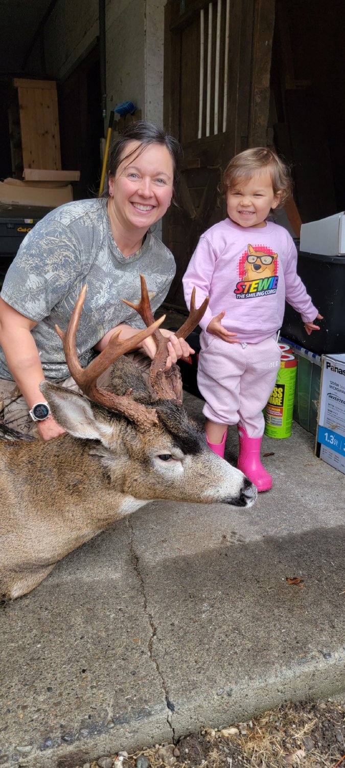 Vikki Trimble provided this photo of a buck she harvested Oct. 31 on Weyerhaeuser land near Bunker Creek. “This was my first solo harvest/hunt and largest buck in over 15 years,” she wrote. “Very proud of this guy and the work that was involved in scouting and hunting him.  … Picture taken with my daughter as she was just as excited about it as her mama.”