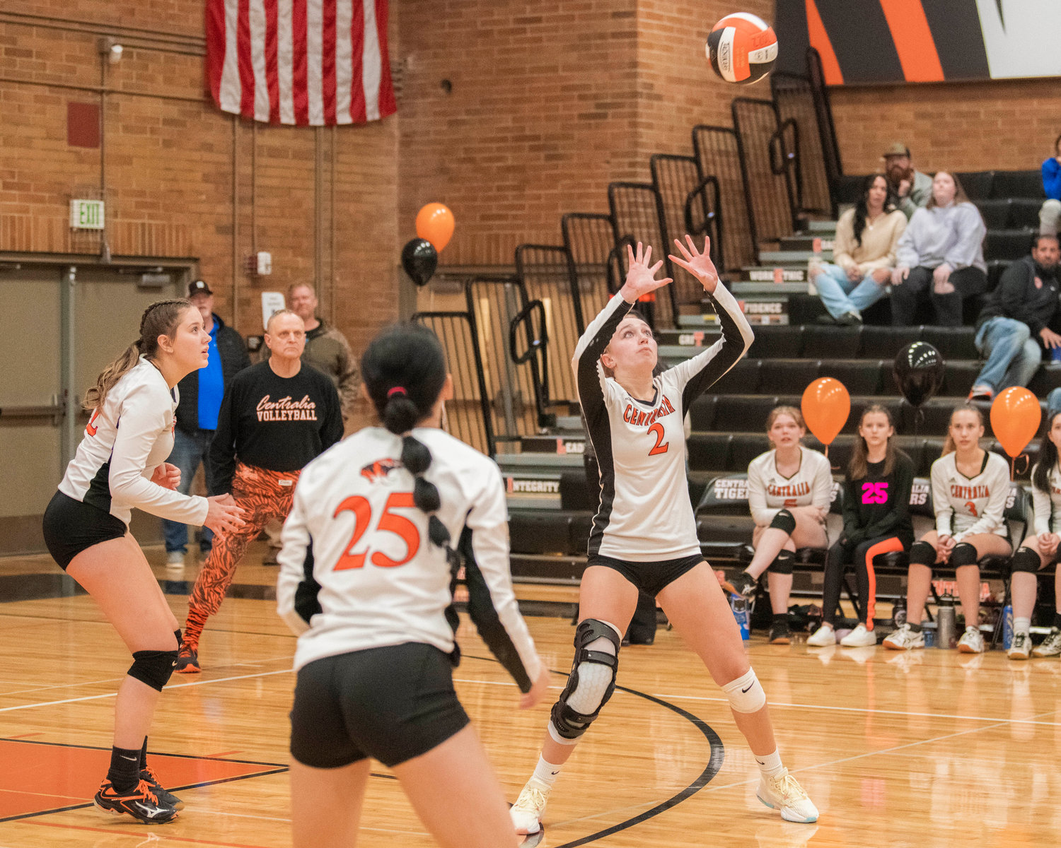 Centralia junior Lauren Wasson (2) hits the ball up Thursday night during a volleyball match against Rochester.