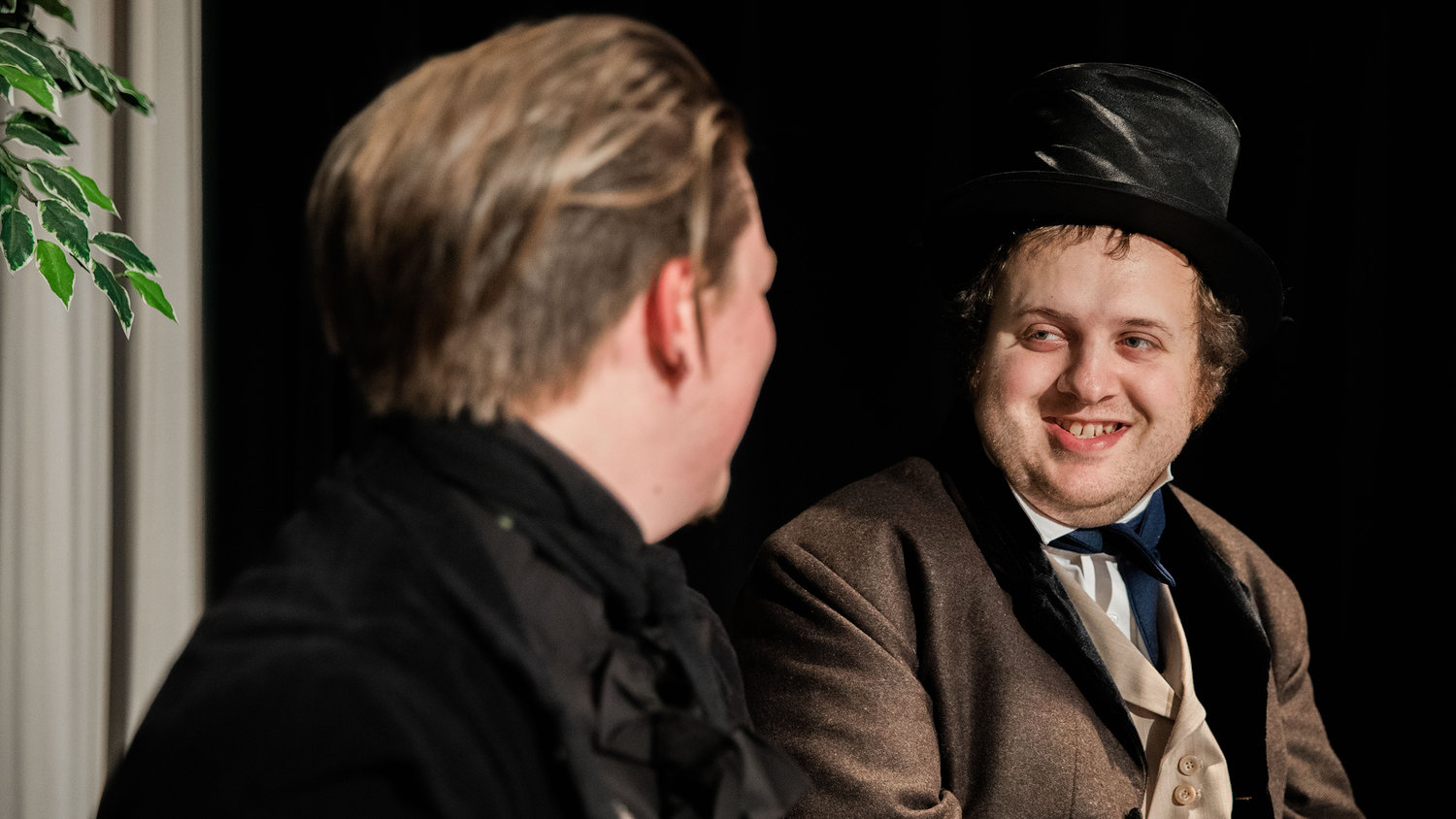 Joe Pettit, right, playing “John Kenyon,” smiles alongside Derek Kealoha playing “Robert Browning,” on stage during dress rehearsals for “Leaving 50 Wimpole Street,” inside the Phillip Wickstrom Studio Theatre at Centralia College on Thursday.