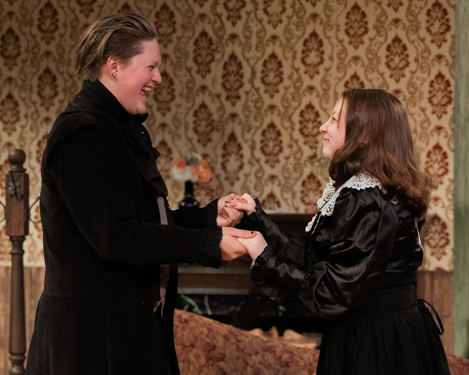Derek Kealoha playing “Robert Browning,” and Alyssa Graves playing “Elizabeth Barrett,” smile while performing on stage during dress rehearsals for “Leaving 50 Wimpole Street,” a play by John Pratt directed by Emmy Kreilkamp presented by the Centralia College Theatre program.