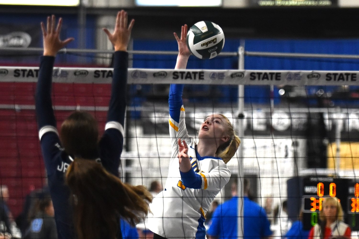 Gaby Guard puts the ball over the net in the second set of No. 5 Adna's three-set win over No. 12 Tri-Cities Prep in the first round of the 2B state volleyball tournament on Nov. 10, at the Yakima Valley SunDome.