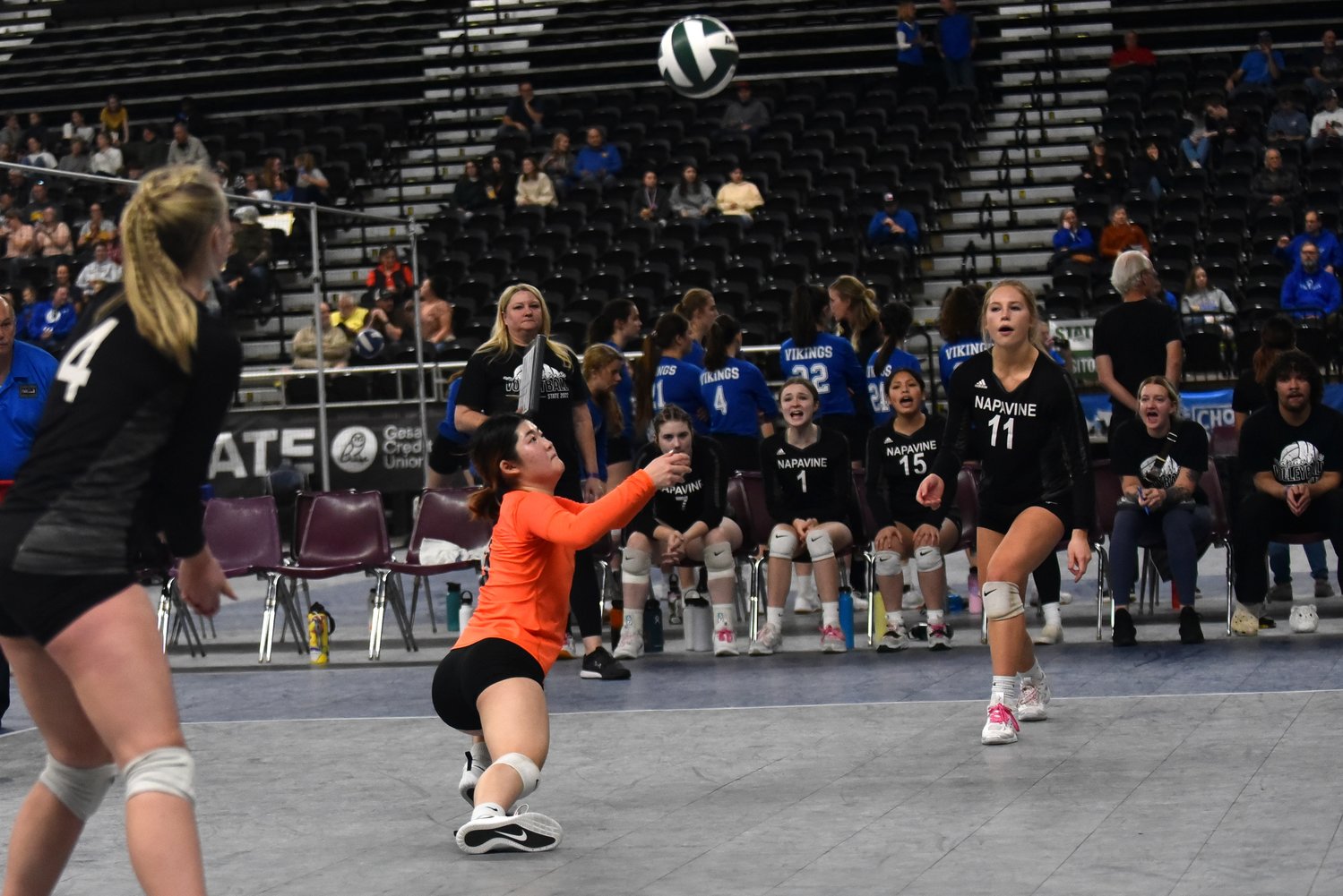 Emily Kang digs up a hard spike during Napavine's four-set loss to Toutle Lake in the first round of the 2B state tournament in Yakima on Nov. 10.