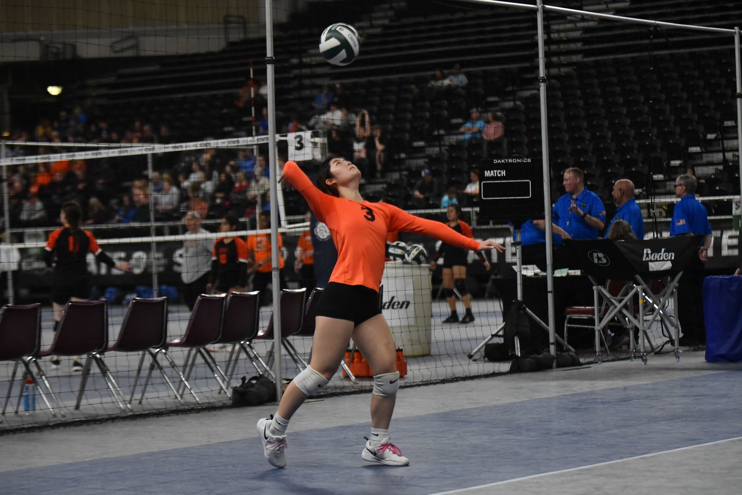 Napavine libero Emily Kang serves the ball during the Tigers' four-set loss to Toutle Lake in the first round of the 2B state tournament on Nov. 10 in Yakima.