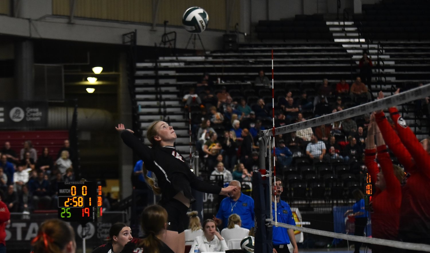 Hailey Brooks goes up for a spike during Mossyrock's sweep of Northport in the 1B state tournament on Nov. 10 in Yakima.