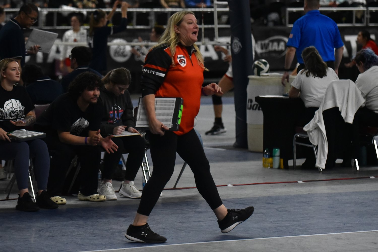 Napavine coach Monica Dailey shouts instructions to her team during the Tigers' four-set win over Forks on Nov. 10 in Yakima.