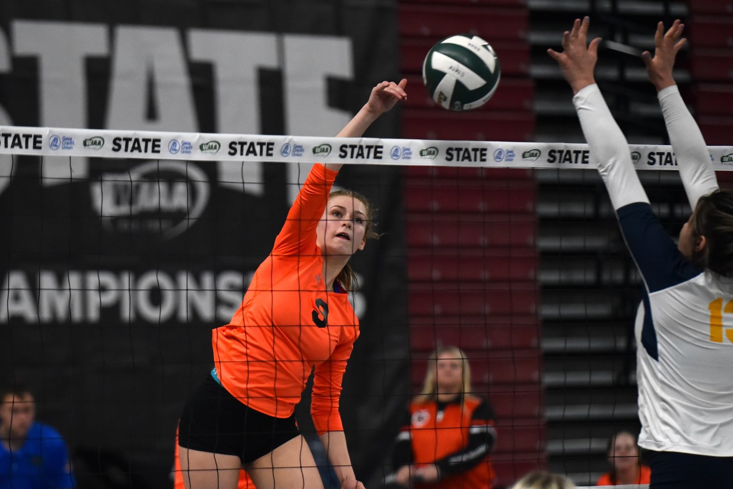 Keira O'Neill sends a spike over the net during Napavine's win over Forks in a loser-out match at the 2B state volleyball tournament in Yakima on Nov. 10.