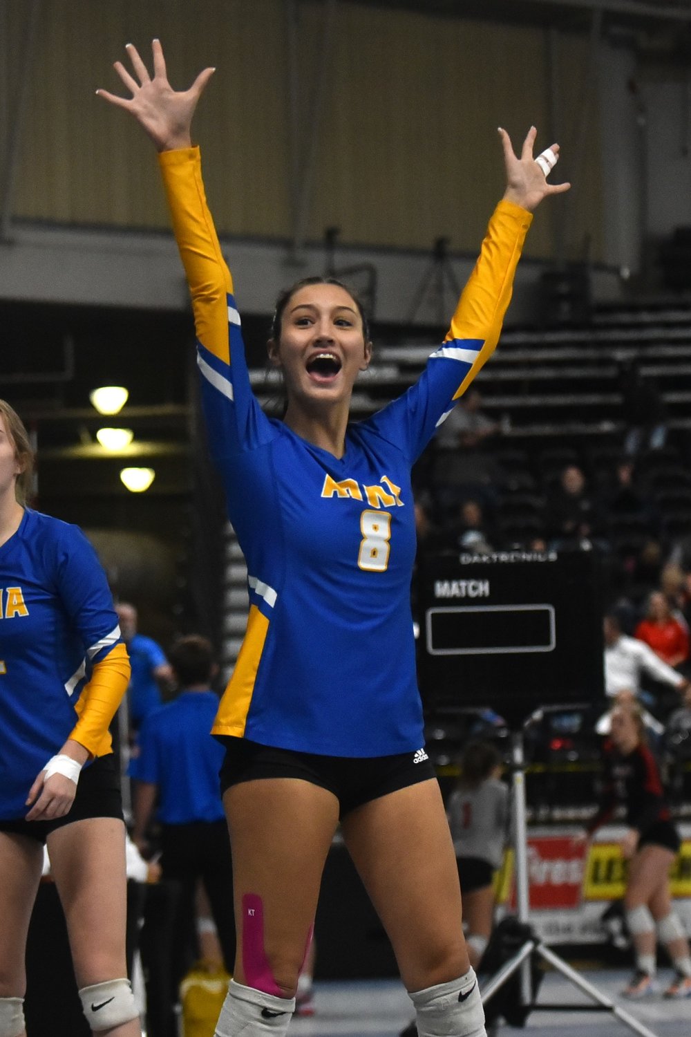 Adna's Charissa Schierman reacts after the referee awards the Pirates a point, during their four-set win over Toutle Lake on Nov. 11 at the 2B state tournament in Yakima.