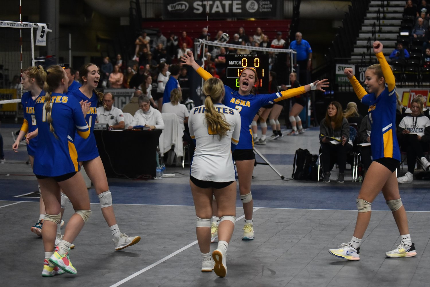 Adna celebrates a point during its four-set win over Toutle Lake in a loser-out match to keep its season alive in the 2B state tournament, in Yakima on Nov. 11.