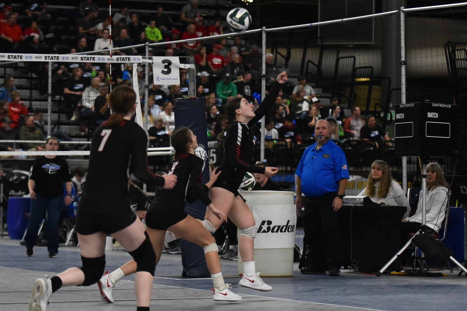 Caelyn Marshall saves the ball with one hand during Mossyrock's three-set loss to No. 1 Oakesdale in the 1B state title game, on Nov. 11 in Yakima.