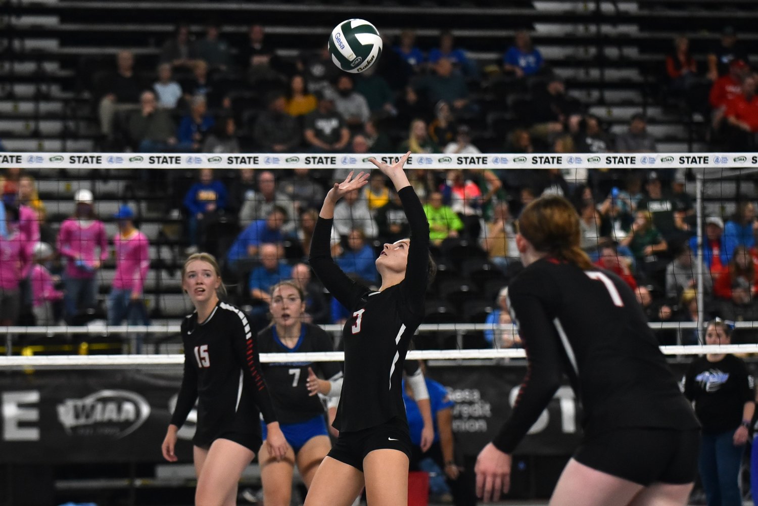 Erin Couryner puts up a pass during Mossyrock's three-set loss to No. 1 Oakesdale in the 1B state title game, on Nov. 11 in Yakima.