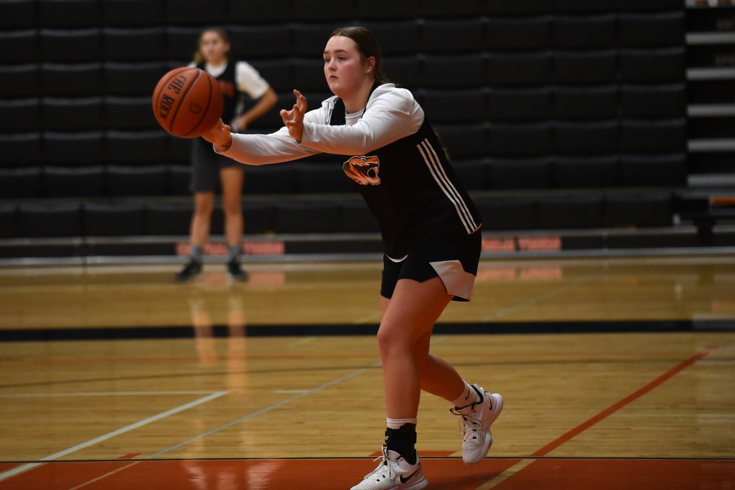 Gracee Cline throws a pass in the post during Centralia's Nov. 23 practice.