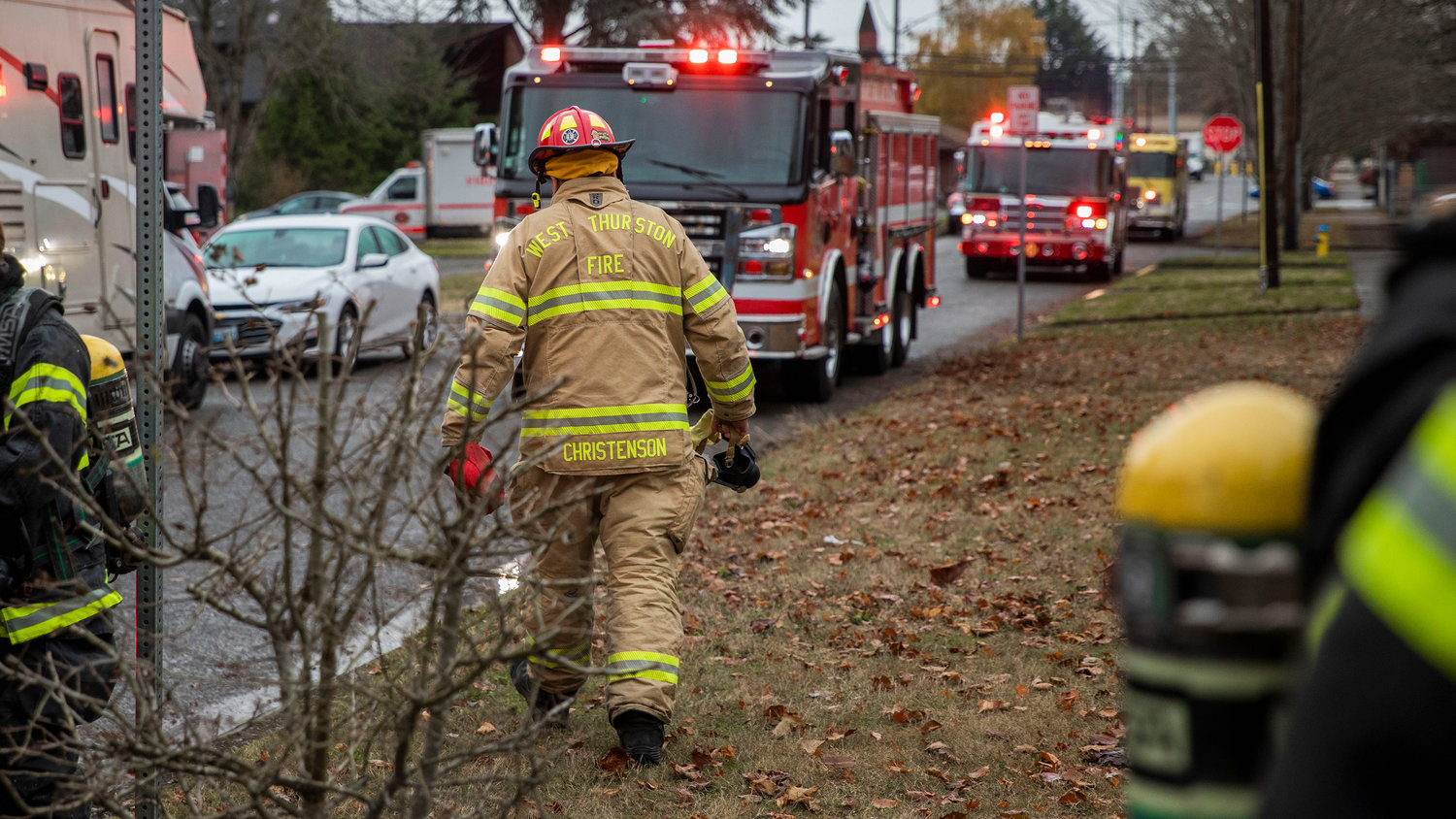 West Thurston Fire responds to the scene of a residential fire in the 200 block of North Rock Street in Centralia on Friday.