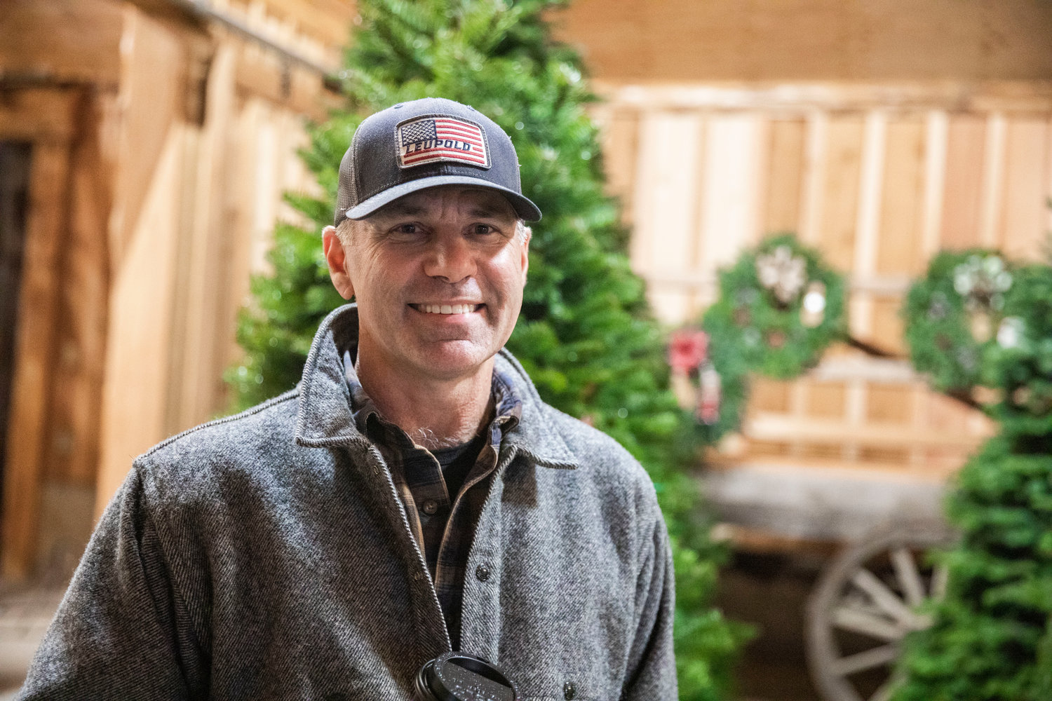 Pat Murphy, who co-owns the Mistletoe Tree Farm with his wife Missy, smiles for a photo Friday evening.