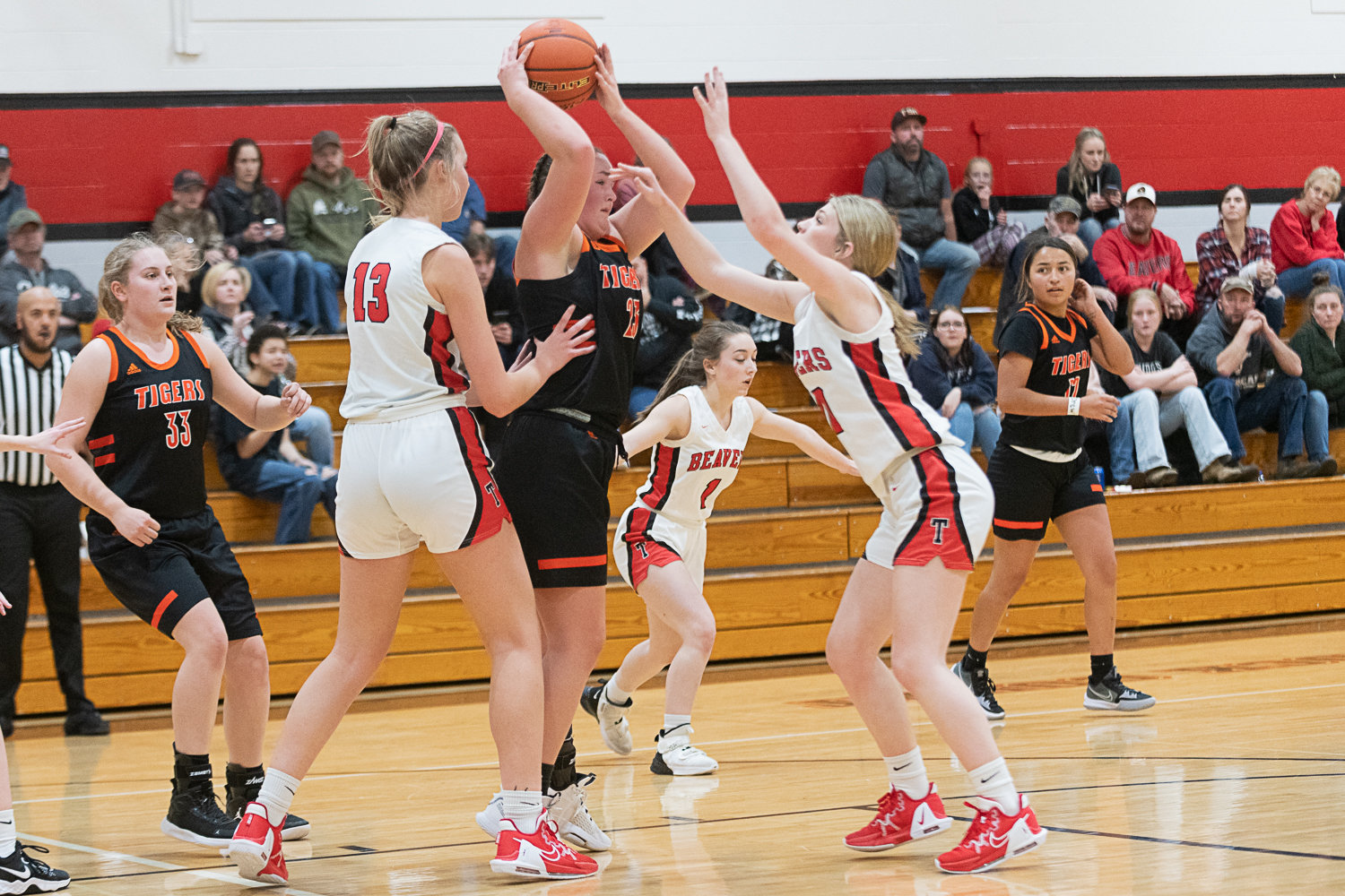 Gracee Cline passes the ball out of the post during the second half of Centralia's 56-16 win over Tenino on Dec. 1.