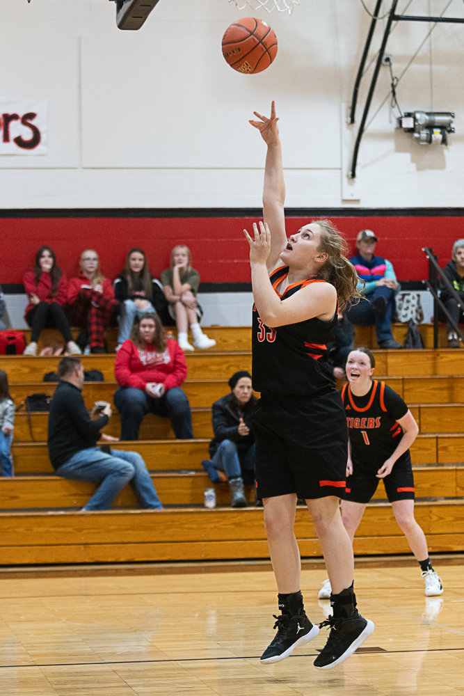Centralia's Emily Wilkerson gets two easy points in the post during the second half of the Tigers' 56-16 win over Tenino on Dec. 1.