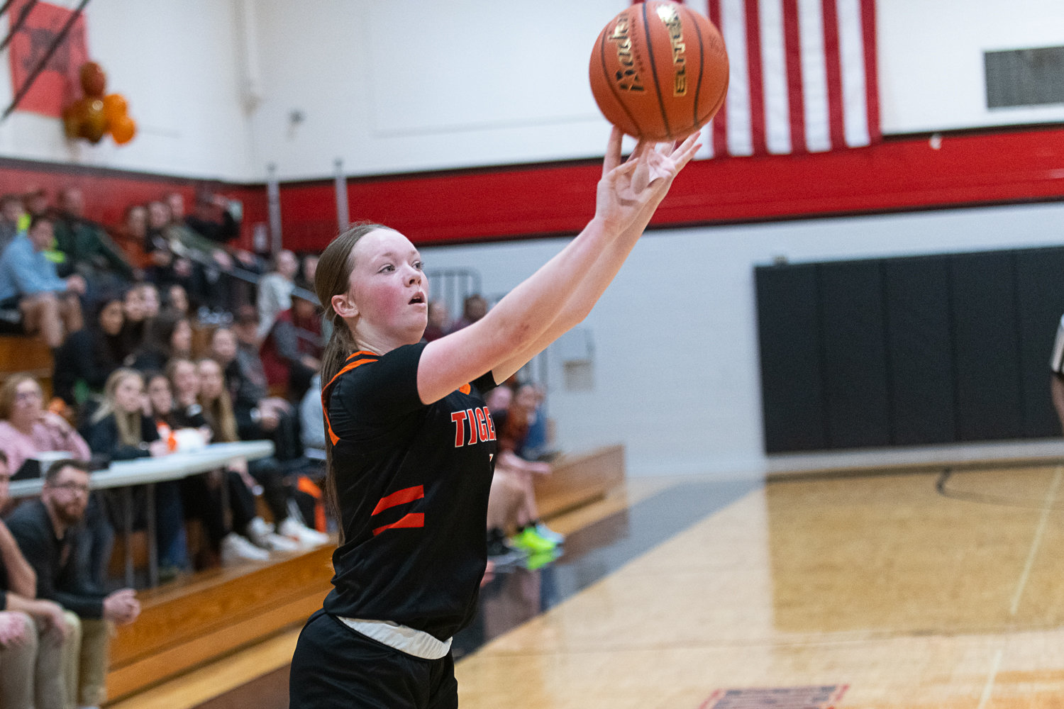 Brooklyn Sprague fires from deep during the second quarter of Centralia's 56-16 win over Tenino on Dec. 1